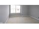 A bedroom featuring a window providing natural light and view at 10609 Banyan Wood Ct, Indianapolis, IN 46239