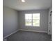 Bedroom featuring light gray walls and plush carpeting at 10609 Banyan Wood Ct, Indianapolis, IN 46239