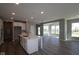 Spacious eat-in kitchen with an island, stainless appliances and hardwood floors at 10609 Banyan Wood Ct, Indianapolis, IN 46239