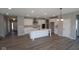 Spacious eat-in kitchen with an island, stainless appliances and hardwood floors at 10609 Banyan Wood Ct, Indianapolis, IN 46239