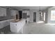 Spacious kitchen featuring white cabinets and a large island ready for customization at 10609 Banyan Wood Ct, Indianapolis, IN 46239