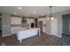 Spacious eat-in kitchen with an island, stainless appliances and hardwood floors at 10609 Banyan Wood Ct, Indianapolis, IN 46239