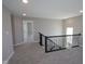Carpeted upstairs loft space at 10609 Banyan Wood Ct, Indianapolis, IN 46239