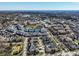 A high-angle view displays an area's residential layout, parks, and water features at 12729 Brandenburg Dr, Carmel, IN 46032
