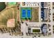 Aerial view showcasing community amenities including tennis courts, pool and baseball field at 12729 Brandenburg Dr, Carmel, IN 46032