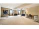 Large basement area with a basketball game, desk, and comfortable seating at 12729 Brandenburg Dr, Carmel, IN 46032