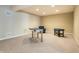 Basement game room featuring a foosball table, and a sitting area at 12729 Brandenburg Dr, Carmel, IN 46032