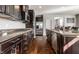 Modern kitchen features granite counters, stainless appliances, and a large central island at 12729 Brandenburg Dr, Carmel, IN 46032
