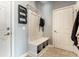 Mudroom with coat hooks, bench with storage and mail organizer at 12729 Brandenburg Dr, Carmel, IN 46032