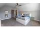 Bedroom featuring carpeted floors, a queen size bed, and plenty of natural light at 1334 E Market St, Indianapolis, IN 46202