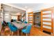 Open-concept dining area with modern table, seating for six, and glass sliding doors at 1334 E Market St, Indianapolis, IN 46202