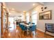 An open dining area with sliding doors to the kitchen, lots of light, with stylish modern decor at 1334 E Market St, Indianapolis, IN 46202