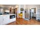 Modern kitchen featuring stainless steel appliances, white cabinetry, and a breakfast bar at 1334 E Market St, Indianapolis, IN 46202