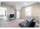 Upstairs living area featuring neutral walls, a small sofa, and lots of natural light at 1334 E Market St, Indianapolis, IN 46202