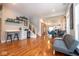 Bright and open-concept living space with wood floors, seamlessly connecting to the dining area and kitchen at 1334 E Market St, Indianapolis, IN 46202