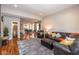 Spacious living room features an open floor plan, hardwood floors, and modern decor at 1334 E Market St, Indianapolis, IN 46202