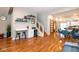Bright and open-concept living space with wood floors, seamlessly connecting to the dining area and kitchen at 1334 E Market St, Indianapolis, IN 46202