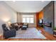 Inviting living room offers a fireplace, hardwood floors, and comfortable seating at 1334 E Market St, Indianapolis, IN 46202