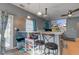 Bar area features pendant lighting, bar seating, and a projector with a mounted screen at 1360 Evergreen Dr, Greenfield, IN 46140