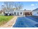 The fenced in backyard with an inground pool is ready for the warmer months with room to entertain at 139 W Jefferson St, Jamestown, IN 46147
