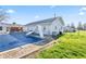 An inground pool is covered for off-season use in a backyard with grass, fencing and other backyard amenities at 139 W Jefferson St, Jamestown, IN 46147