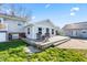 A well-maintained backyard with a wooden deck area, complemented by lush green grass at 139 W Jefferson St, Jamestown, IN 46147