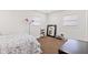 Bright bedroom with two windows, a mirror with lights, and ample space for furniture at 139 W Jefferson St, Jamestown, IN 46147