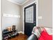 Functional entryway with shoe rack and coat hooks, offering storage solutions at 139 W Jefferson St, Jamestown, IN 46147