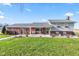 Charming two-story home with a landscaped yard, brick accents, and a welcoming front porch at 139 W Jefferson St, Jamestown, IN 46147