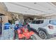 Garage with plenty of storage, bike, ATV, and a Jeep at 139 W Jefferson St, Jamestown, IN 46147