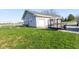 Detached two-car garage provides ample space for parking with an attached workshop area at 139 W Jefferson St, Jamestown, IN 46147