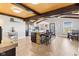 Open kitchen featuring a large center island with seating, stainless steel appliances, and a wood-paneled ceiling at 139 W Jefferson St, Jamestown, IN 46147