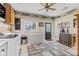 Spacious laundry room featuring a washer, dryer, freezer, sink, and quirky decor at 139 W Jefferson St, Jamestown, IN 46147