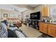 Comfortable living area features a spacious bedroom, sleek entertainment center, and a kitchenette for added convenience at 139 W Jefferson St, Jamestown, IN 46147