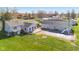 Backyard view of home featuring a pool, deck, and well-maintained lawn at 139 W Jefferson St, Jamestown, IN 46147