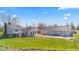 Image highlighting home exterior, pool, deck, and fenced yard on a sunny day at 139 W Jefferson St, Jamestown, IN 46147