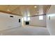 Finished basement features carpet flooring, a wood ceiling, and a fireplace at 14402 Allison Dr, Carmel, IN 46033