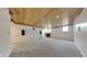 Finished basement featuring carpet flooring, a wood ceiling, and a fireplace at 14402 Allison Dr, Carmel, IN 46033