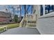 Exterior photo of a two story deck with stairs and a grey painted wood surface at 14402 Allison Dr, Carmel, IN 46033