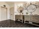 Stylish bathroom featuring dual vanities, round mirrors, bold hexagon floors, and modern fixtures at 1448 Sedona Dr, Carmel, IN 46032