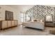 Inviting bedroom featuring a wallpaper accent wall, neutral furnishings, and soft natural light at 1448 Sedona Dr, Carmel, IN 46032