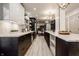 Contemporary kitchen showcases bright marble countertops, sleek stainless steel appliances, and open layout at 1448 Sedona Dr, Carmel, IN 46032