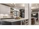 Bright kitchen boasts a large island with modern pendant lighting and ample counter space at 1448 Sedona Dr, Carmel, IN 46032