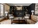 Inviting living room showcasing a black brick fireplace and built-in bookshelves at 1448 Sedona Dr, Carmel, IN 46032
