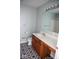 Well-lit bathroom complete with a large mirror and vanity at 14573 Waverly Dr, Carmel, IN 46033