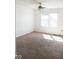 Bedroom with carpet features a window for natural light and ceiling fan at 14573 Waverly Dr, Carmel, IN 46033