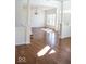 Open concept living area with hardwood floors, bright lighting and spacious layout at 14573 Waverly Dr, Carmel, IN 46033