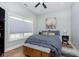 Comfortable bedroom with a queen bed, soft linens, stylish decor, and a window with blind at 15254 Kampen Cir, Carmel, IN 46033