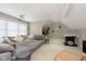 Spacious living room with a projector, a large gray sofa, and a foosball table at 15254 Kampen Cir, Carmel, IN 46033