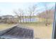 A peaceful backyard view overlooking a small pond and neighboring homes at 15925 Cobbs Crk Ln, Noblesville, IN 46060